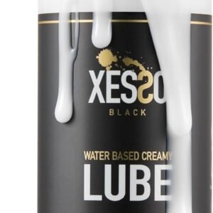 White extra-creamy water-based personal lubricant in its dispenser