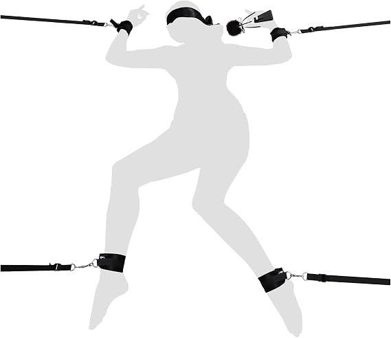Under-bed BDSM restraint kit with adjustable cuffs, lace eye mask, and feather tickler